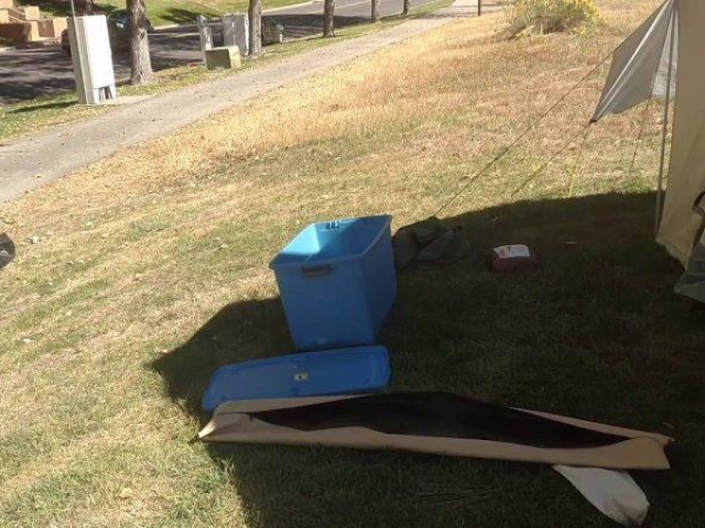 14x16 Davis wall tent shown with tarp setup